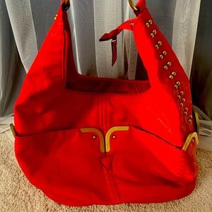 Red purse with gold hardware